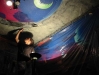 Working on a mural on a ceiling, 2001